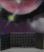 کیبورد بلوتوثی تاشو همراه با صفحه لمسی