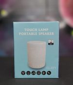 لامپ لمسی و اسپیکر قابل حمل